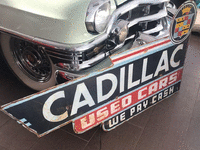 Image 1 of 2 of a N/A CADILLAC USED CAR SIGN