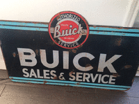 Image 1 of 2 of a N/A BUICK SALES AND SERVICE SIGN
