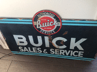 Image 2 of 2 of a N/A BUICK SALES AND SERVICE SIGN
