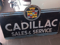 Image 2 of 2 of a N/A CADILLAC SALES AND SERVICE SIGN