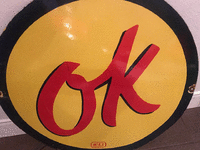 Image 1 of 1 of a N/A OK USED CAR SIGN MCAX MANUFACTURER LOGO