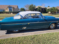 Image 4 of 15 of a 1954 FORD CRESTLINER CROWN VICTORIA