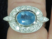 Image 3 of 5 of a N/A OVAL AQUAMARINE DIAMOND RING
