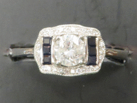 Image 1 of 4 of a N/A LADY DIAMOND SAPPHIRE SOLITAIRE RING