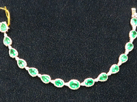 Image 1 of 5 of a N/A NATURAL EMERALD BERYL AND DIAMOND BRACELET