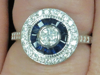 Image 4 of 6 of a N/A GOLD DIAMOND SAPPHIRE RING