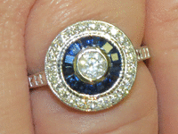 Image 5 of 6 of a N/A GOLD DIAMOND SAPPHIRE RING