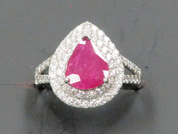Image 1 of 6 of a N/A PLANTINUM MOZAMBIQUE RUBY CORUNDUM & DIAMOND RING