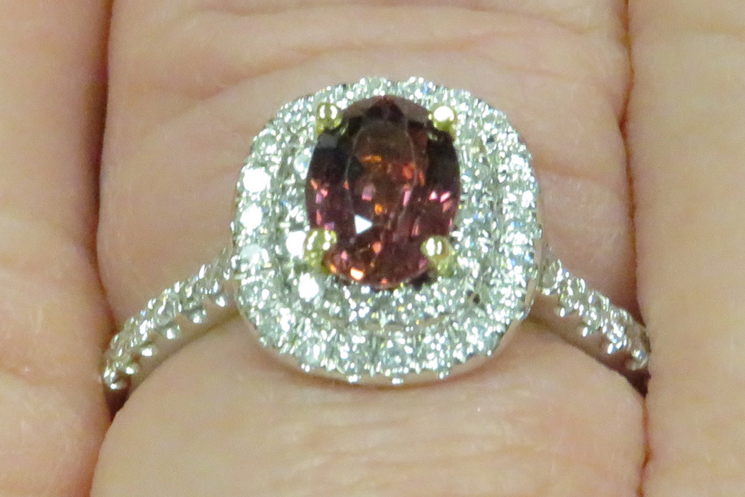 2nd Image of a N/A LADIES CAST ORANGE SAPPHIRE & DIAMOND RING