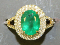 Image 1 of 4 of a N/A GOLD CUSTOM MADE LADY'S DIAMOND & EMERALD RING