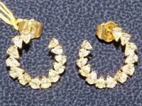 Image 1 of 3 of a N/A GOLD PEAR& OVAL DIAMOND EARRINGS