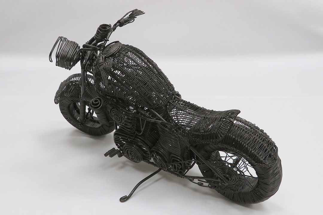 2nd Image of a N/A WIRE FOLKART BIKE SCULPTURE