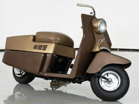 Image 1 of 12 of a 1958 CUSHMAN ROAD KING