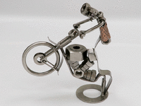Image 5 of 6 of a N/A METAL MAN POPPING WHEELY