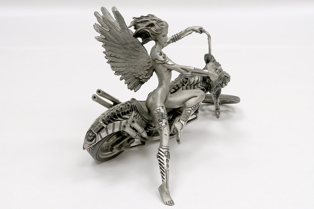 2nd Image of a N/A TEMPTATION RIDES SCULPTURE