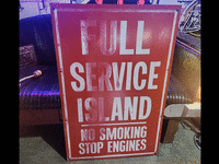 Image 1 of 2 of a N/A FULL SERVICE ISLAND NO SMOKING STOP ENGINES