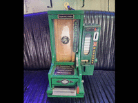 Image 1 of 4 of a N/A CIGARETTE & MATCHES DISPENSING MACHINE