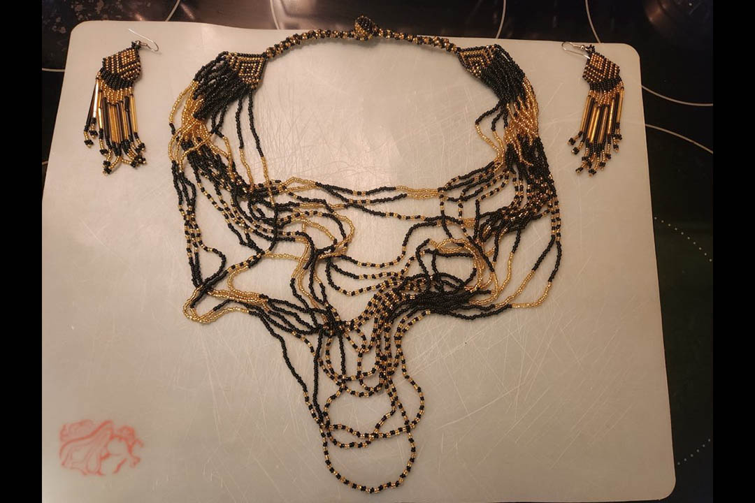 0th Image of a N/A BEADED BLK & GLD NECKLACE & EARRINGS