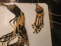 Image 2 of 4 of a N/A BEADED BLK & GLD NECKLACE & EARRINGS