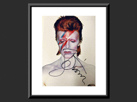 Image 1 of 1 of a N/A ALADDIN SANE DAVID BOWIE SIGNED PHOTO