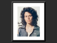 Image 1 of 1 of a N/A ALIEN SIGOURNEY WEAVER SIGNED MOVIE PHOTO