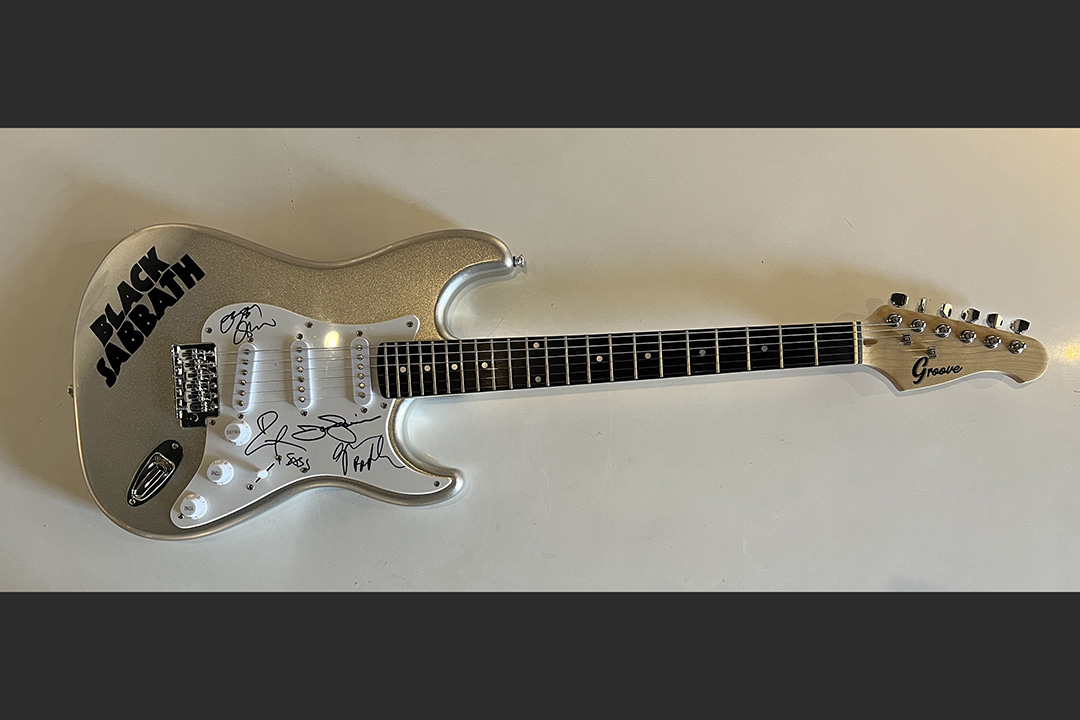 0th Image of a N/A BLACK SABBATH BAND STRAT STYLE GUITAR SIGNED