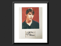 Image 1 of 1 of a N/A TOM CRUISE ORIGINAL SIGNATURE AND PHOTO IN CUSTOM MATTE