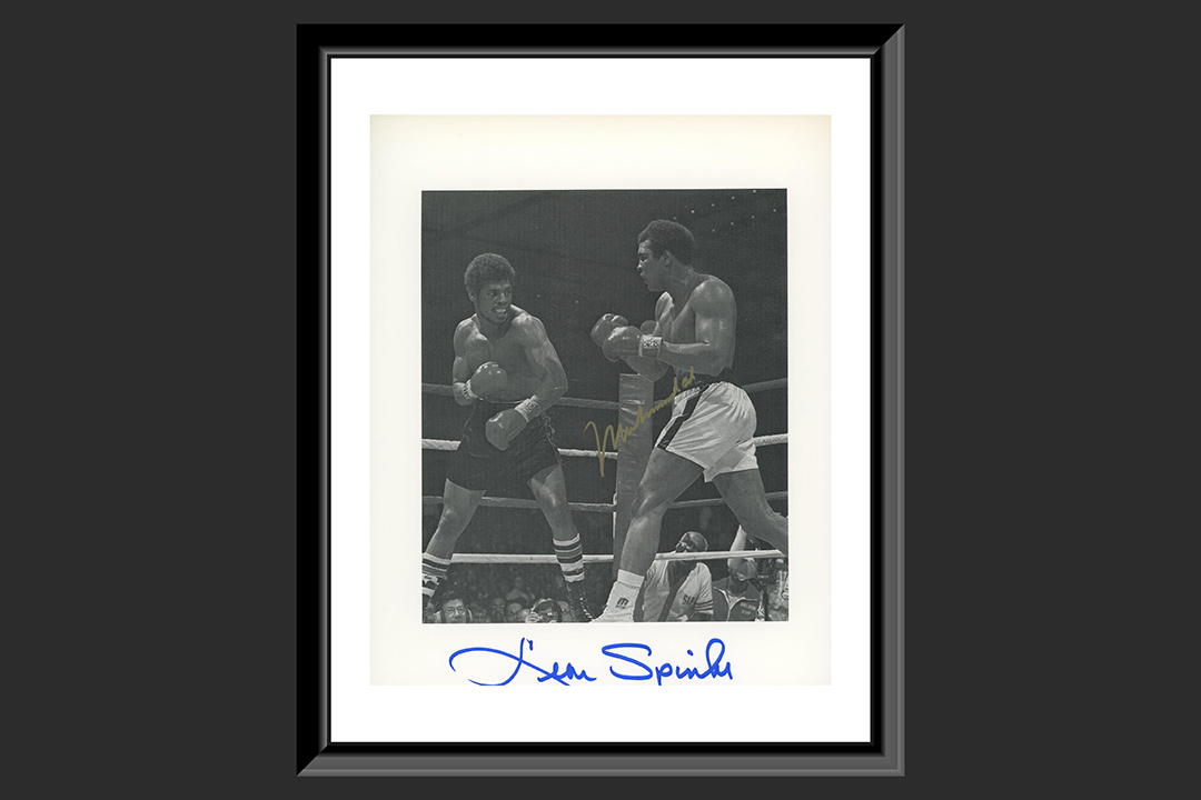 0th Image of a N/A MUHAMMAD ALI VS LEON SPINKS SIGNED PHOTO