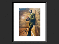 Image 1 of 1 of a N/A WALT FRAZIER SIGNED PHOTO
