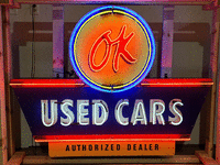 Image 1 of 8 of a N/A OK USED CARS ANIMATED TIN