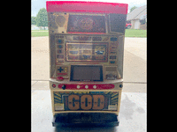 Image 1 of 1 of a N/A GOD GAME SLOT MACHINE