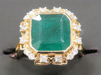 Image 1 of 8 of a N/A LADY'S EMERALD DIAMOND RING