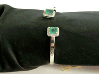 Image 2 of 4 of a N/A 18K GOLD EMERALD DIAMOND BANGLE