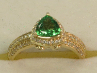 Image 2 of 8 of a N/A TSAVORITE GARNET DIAMOND