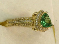 Image 3 of 8 of a N/A TSAVORITE GARNET DIAMOND