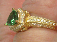 Image 6 of 8 of a N/A TSAVORITE GARNET DIAMOND