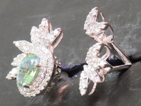 Image 2 of 7 of a N/A 18K GLD CHRYSOBERYL DIAMOND