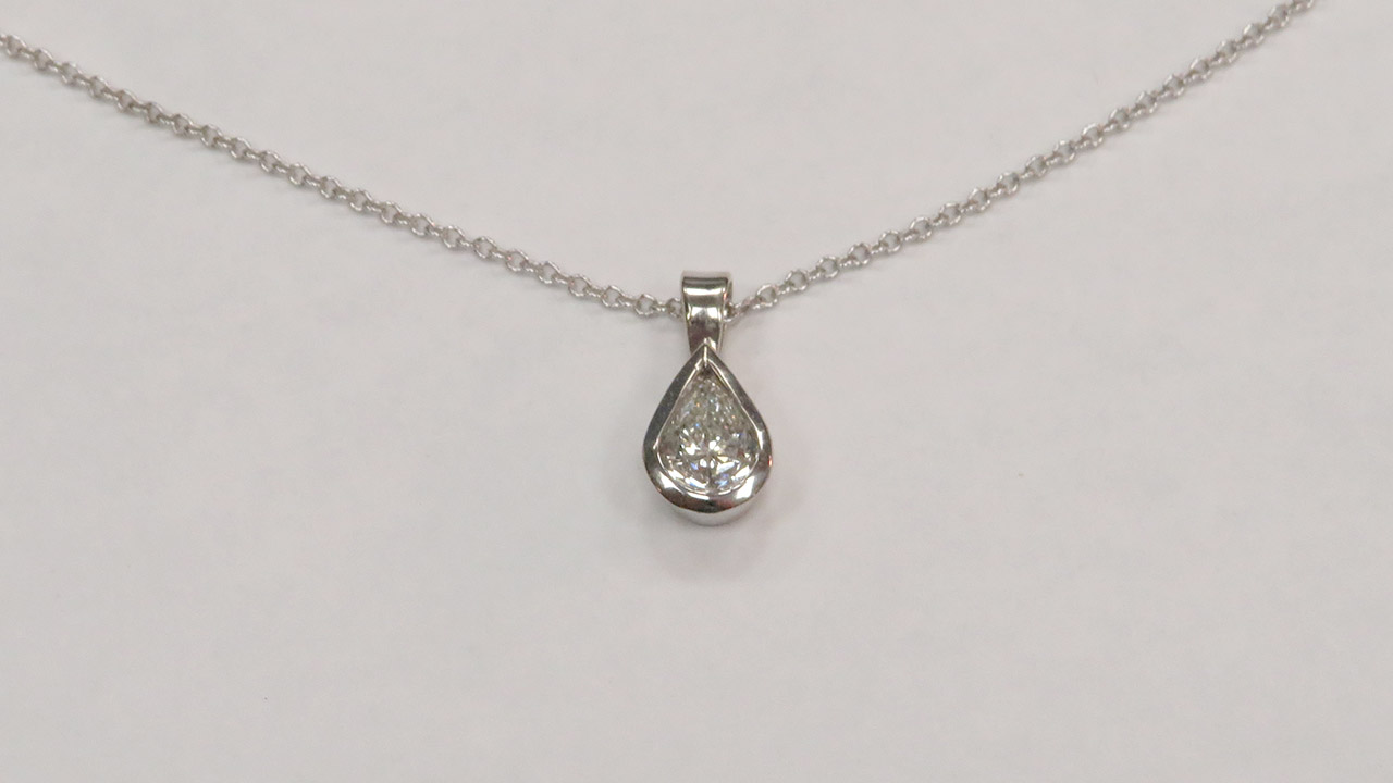 2nd Image of a N/A 14K GOLD DIAMOND SOLITAIRE PENDANT