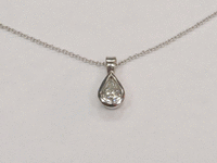 Image 3 of 4 of a N/A 14K GOLD DIAMOND SOLITAIRE PENDANT