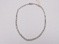 Image 1 of 6 of a N/A 18K WHI GLD EMERALD & PEAR CUT DIAMOND