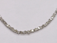 Image 5 of 6 of a N/A 18K WHI GLD EMERALD & PEAR CUT DIAMOND