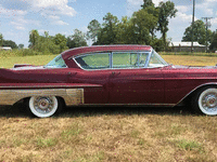 Image 4 of 12 of a 1957 CADILLAC SEDAN