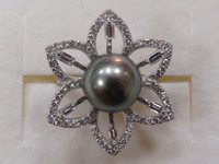 Image 1 of 9 of a N/A WHITE GOLD CULTURED SOUTH SEA PEARL AND DIAMOND RING