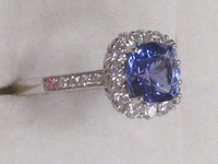Image 2 of 8 of a N/A WHITE GOLD NATURAL TANZANITE ZOISITE AND DIAMOND RING