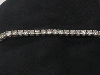 Image 4 of 5 of a N/A WHITE GOLD ROUND BRILLIANT CUT DIAMOND BRACELET