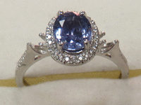 Image 1 of 8 of a N/A PLATINUM SAPPHIRE AND DIAMOND RING