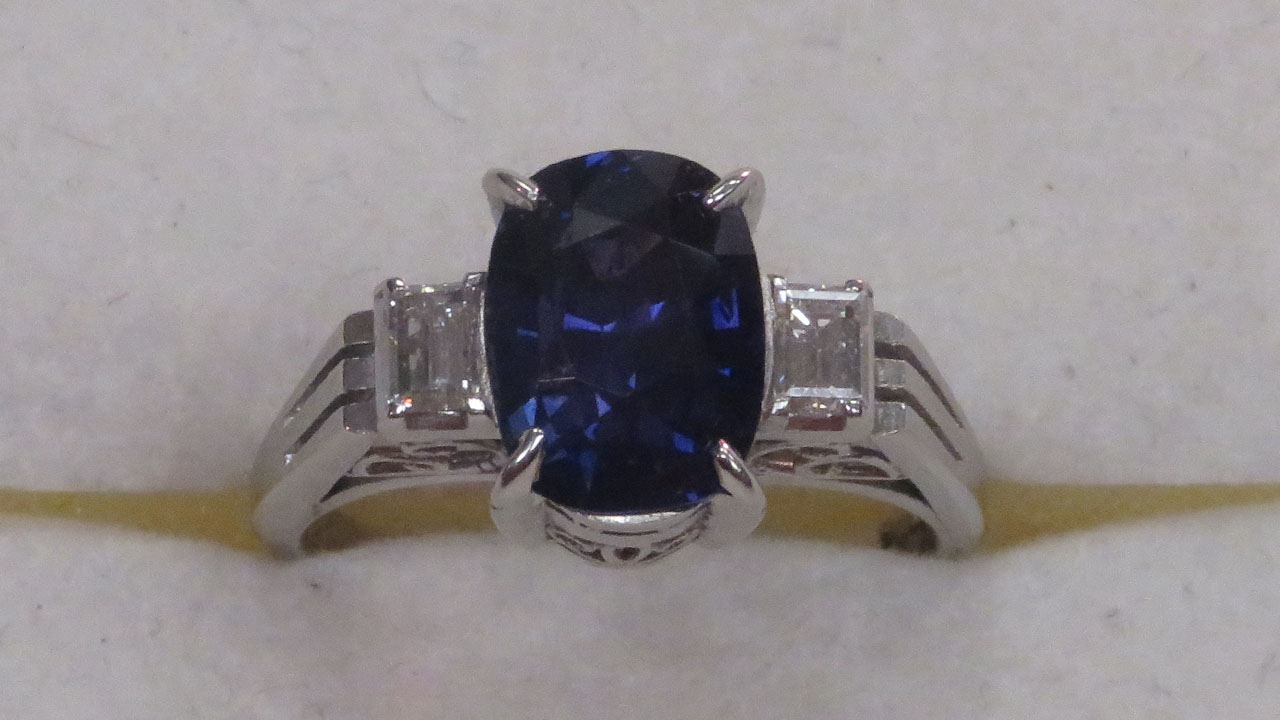 1st Image of a N/A PLATINUM SAPPHIRE CORUNDUM AND DIAOMOND RING