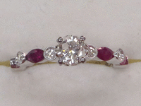 Image 1 of 9 of a N/A 18K GOLD DIAMOND AND RUBY RING