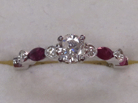 Image 2 of 9 of a N/A 18K GOLD DIAMOND AND RUBY RING