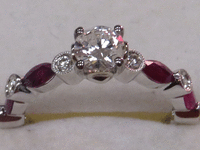 Image 3 of 9 of a N/A 18K GOLD DIAMOND AND RUBY RING